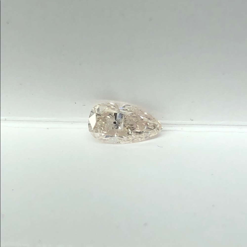 0.61 Light Brown Pink Pear Shape Diamond